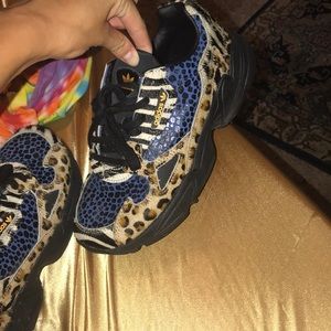 Barley worn animal print adidas shoes faux fur